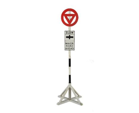 A scaled model of a road sign 'Slow Major Road Ahead', suitable for garden railway use on free-standing base. Height 169cm.