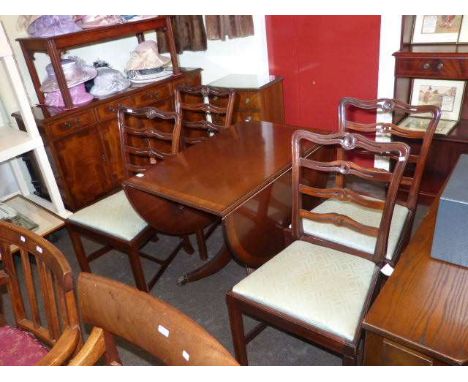 Mahogany seven piece dining suite comprising sideboard, centre stalk drop leaf table, four wavy ladder back chairs and coffee