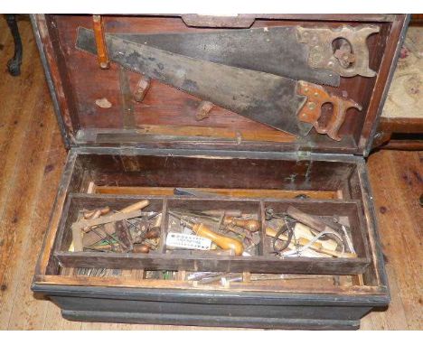 Fitted pine tool box with a good selection of tools including chisels, planes, saws, etc