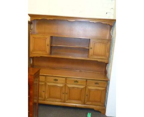 Stag shelf and cupboard back four door dresser