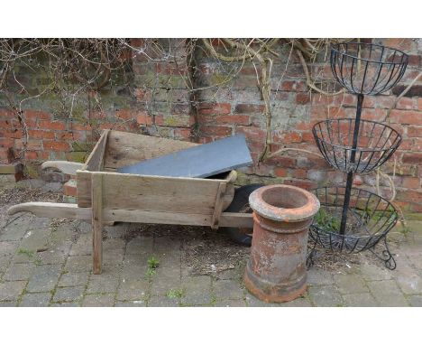 Wooden wheel barrow, wrought iron 3 tier planter, chimney pot & a piece of Welsh slate