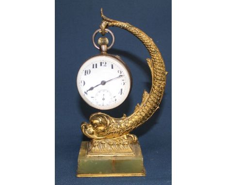 Swiss made manual wind The Atlas Watch solid glass ball clock / watch, supported by gilt metal fish on onyx base