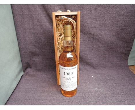 A bottle of Oban 24 Year Old Single Malt Scotch Whisky, distilled March 23rd and cask filled March 24th 1989, bottled July 20