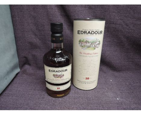 A bottle of Edradour 10 Year Distillery Edition Single Highland Malt Scotch Whisky, 40% vol, 70cl, in card tube