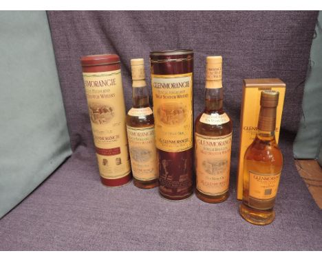 Three bottles of 2000's Glenmorangie 10 Year Old Single Highland Malt Scotch Whisky, 40% vol, 70cL x2 both in tin tubes and 4