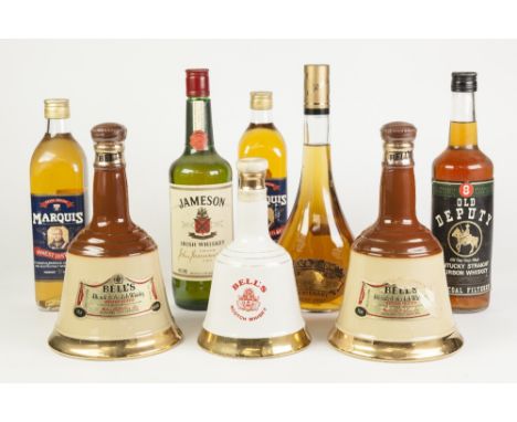 TWO 75cl BOTTLES OF BELL'S BLENDED SCOTCH WHISKY IN BELL SHAPED POTTERY BOTTLES, together with ANOTHER, SMALLER, ROYAL COMMEM