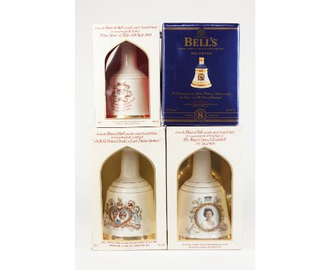 FOUR BOXED BOTTLES OF ROYAL COMMEMORATIVE BELL'S SCOTCH WHISKY IN BELL SHAPED POTTERY DECANTERS, comprising: GOLDEN WEDDING A