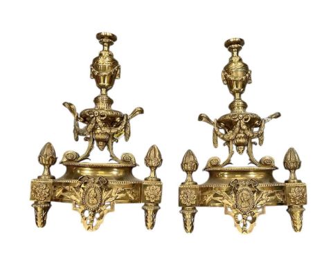 A pair of early 20th century Neoclassical design brass firedog ends, height 45cm, length 29cm (2).