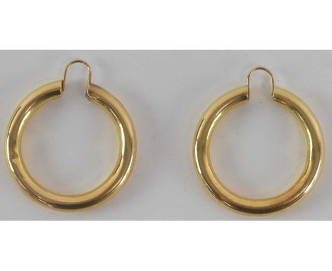 A pair of yellow metal hoop earrings, both diameter approx 3.5cm, combined weight approx 10g.