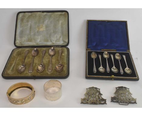 WILLIAM HUTTON &amp; SONS LTD; a cased set of six George V hallmarked silver coffee spoons, Sheffield 1916 and a cased set of