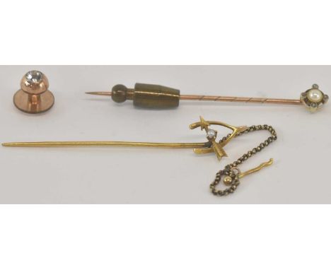 A yellow metal seed pearl and diamond set stick pin, length 5.5cm, a yellow metal seed pearl set stick pin, with safety chain