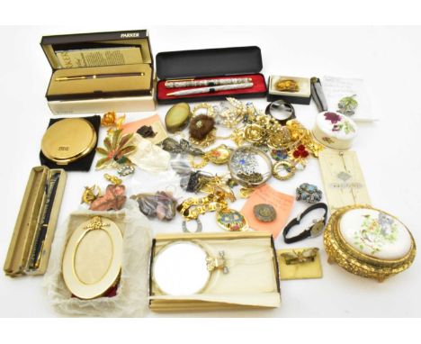 A group of costume jewellery including silver bracelet, hinged bracelet, brooches, earrings, hat pins, also trinket boxes, ph