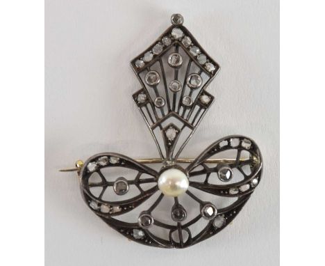 An Edwardian yellow metal diamond and seed pearl set drop brooch/pendant, set with multiple small rough cut diamonds and cent