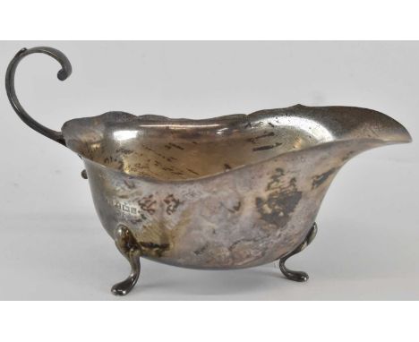 WILLIAM SUCKLING LTD; an Elizabeth II hallmarked silver sauce boat, Birmingham 1956, height 8.5cm, width 16cm, approx 2.90ozt