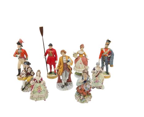 Nine early 20th century and later Continental porcelain figures, including 'Queen's Guard', height 29.5cm, two further office