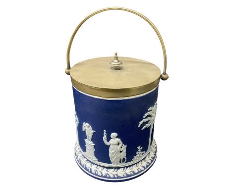 WEDGWOOD; an early 20th century jasper dip biscuit barrel with brass mounts and lid, with swing loop handle, height to top of