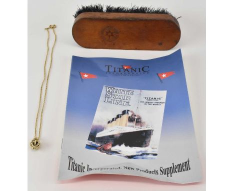 TITANIC INTEREST; a gold plated fine link necklace, length approx 44cm, suspending a gold plated pendant enclosing a piece of