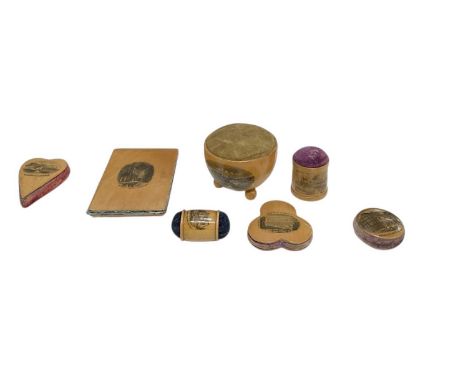 MAUCHINE WARE; seven pin cushions, a pill box sized pin cushion, 'Shakespeare's House', diameter 3.5cm, a three leaf clover s