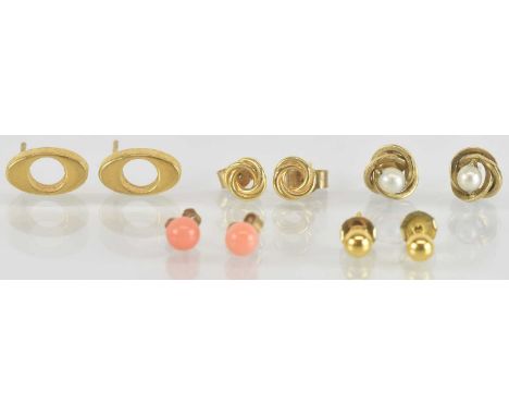 Five pairs of yellow metal earrings and ear studs, including a coral set pair of ear studs, seed pearl set pair of ear studs,