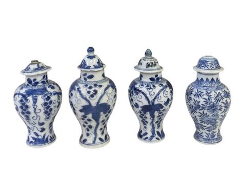 A pair of 19th century Chinese blue and white porcelain lidded jars, both with associated lids, both height approx 13cm, and 