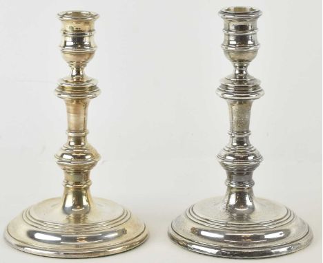 M C HERSEY &amp; SON LTD; a pair of Elizabeth II hallmarked silver candlesticks, London 1983, height 17cm, (loaded) (2).
