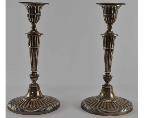 WILLIAM HUTTON &amp; SONS LTD; a pair of late Victorian hallmarked silver candlesticks, London 1900, both height 29cm (loaded