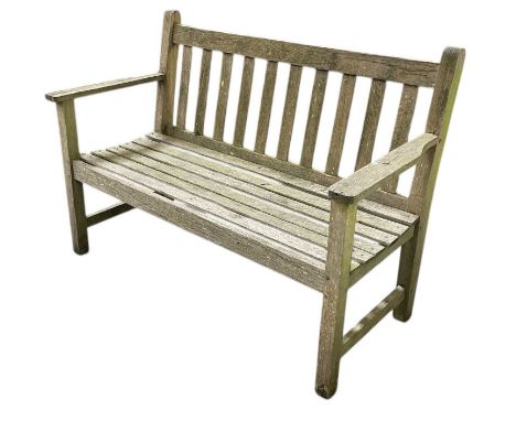 BARLOW TYRIE LTD; a modern teak garden bench, width 121cm.