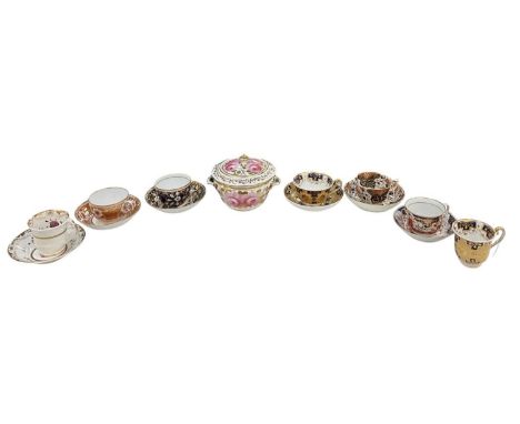 An early to mid 19th century hand painted sucrier, possibly Davenport, decorated with pink foliate designs amongst gilt decor