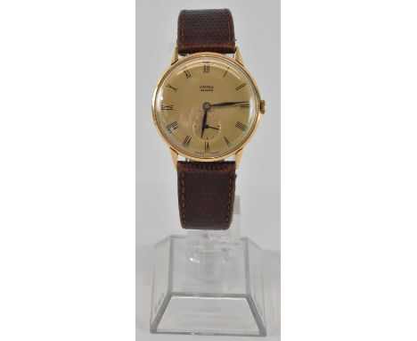 DAMAS; a gentleman's 18ct yellow gold anti-magnetic 'Fab Suisse' wristwatch, the dial set with Roman numerals and subsidiary 