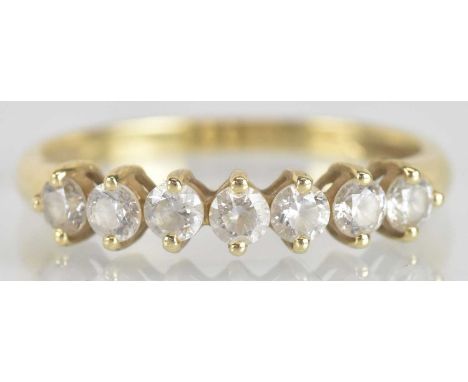 A 14ct yellow gold seven white stone ring, size R/S, approx 2.2g.