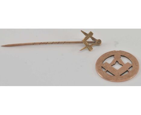 A 9ct yellow gold Masonic stick pin and a 9ct Masonic circular pendant (lacking loop), length of stick pin 4.5cm, approx comb