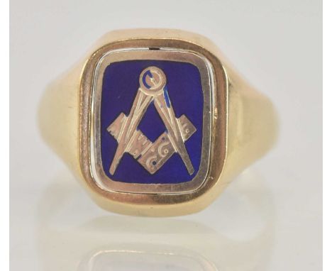 MASONIC INTEREST; a 9ct yellow gold signet ring, with revolving front, one side with blue enamel Masonic compass decoration, 