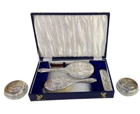 DEAKIN &amp; FRANCIS LTD; a Queen Elizabeth II six piece silver and glass dressing table set, comprising a blue presentation 