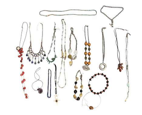 A group of ethnic and semi-precious stone set costume jewellery including necklaces, bracelets, pendants, beads, etc.