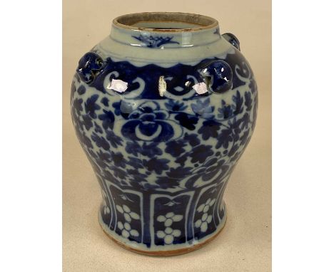An 18th century Chinese blue and white jar, with applied lugged detail and floral painted decoration, height 27.5cm.Condition