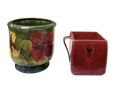 WILLIAM MOORCROFT; an early 20th century twin handled red 'Flamminian' glazed pot, height 13cm, width 12cm, (af), and a Moorc