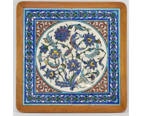 A Turkish Ottoman Iznik/Kutahya four section tile, in modern wooden frame, possibly 19th century, 46 x 46cm including wooden 