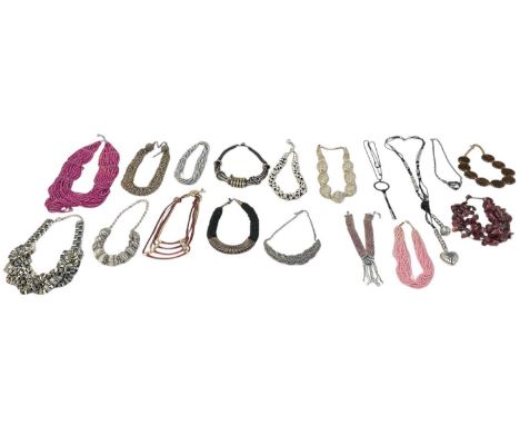 Eighteen costume jewellery necklaces including a pink bead multistrand necklace, length approx 60cm, a seed pearl effect mult