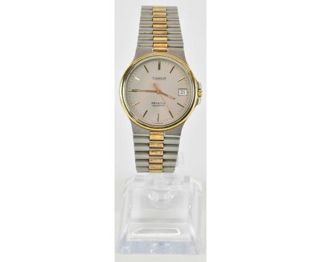 TISSOT; a gentleman's bicolour Seamaster quartz wristwatch, with stainless steel face, baton markers with seconds markers bet