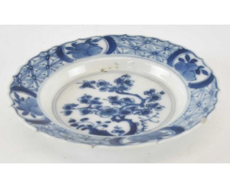 An 18th century Chinese Kangxi blue and white porcelain saucer, with six character Kangxi mark to base, diameter 10cm.