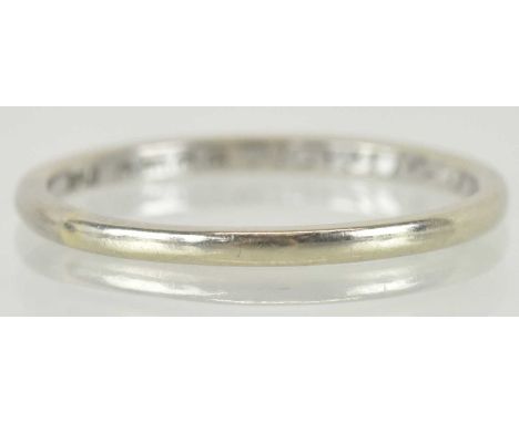 An 18ct white gold thin band ring, with inscription to the inner shank 'MAMP-JWL 25 33', size N, approx 1.6g.