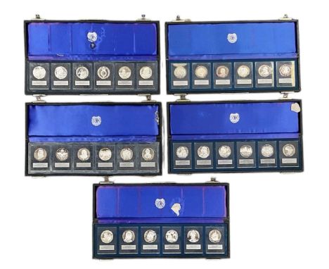 BRITANNIA COMMEMORATIVE SOCIETY LTD; five cased sets of 999 fine silver proof cased commemorative coins, including Battle of 
