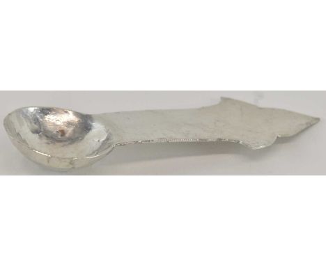 An early 20th century Arts and Crafts white metal caddy spoon, with triangular shaped handle top, length 8.5cm.Provenance: Pl