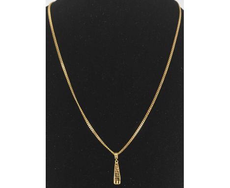 A 14ct yellow gold Egyptian type pendant, suspended on 9ct yellow gold flat link necklace, length approx 46cm, combined appro