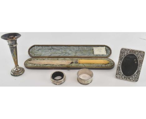 T H HAZELWOOD &amp; CO; an Edward VII hallmarked silver trumpet vase, Birmingham 1909, height 12cm, also a Victorian hallmark