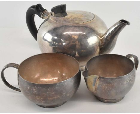 A stylish 1950s hallmarked silver three piece tea service, Chester 1959, combined approx 31.6ozt/984g (3).