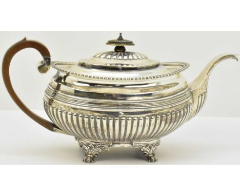 THOMAS WALLIS (II) &amp; JONATHAN HAYNE; an early 19th century hallmarked silver teapot, with oval bone finial and wooden han