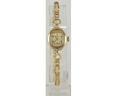 ROTARY; a lady's 9ct gold wristwatch, the white dial set with numbers at 2, 4, 6, 8, 10 and 12 o'clock, baton markers between