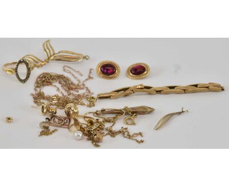 A quantity of scrap 9ct yellow gold and yellow metal jewellery, including watch strap section, broken chains, fine link neckl