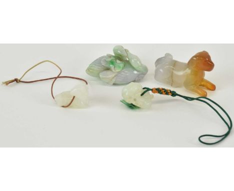 A Chinese carved jade group of two ducks, with dark green inclusions, length 5cm, two small Chinese jade carvings, lengths ap